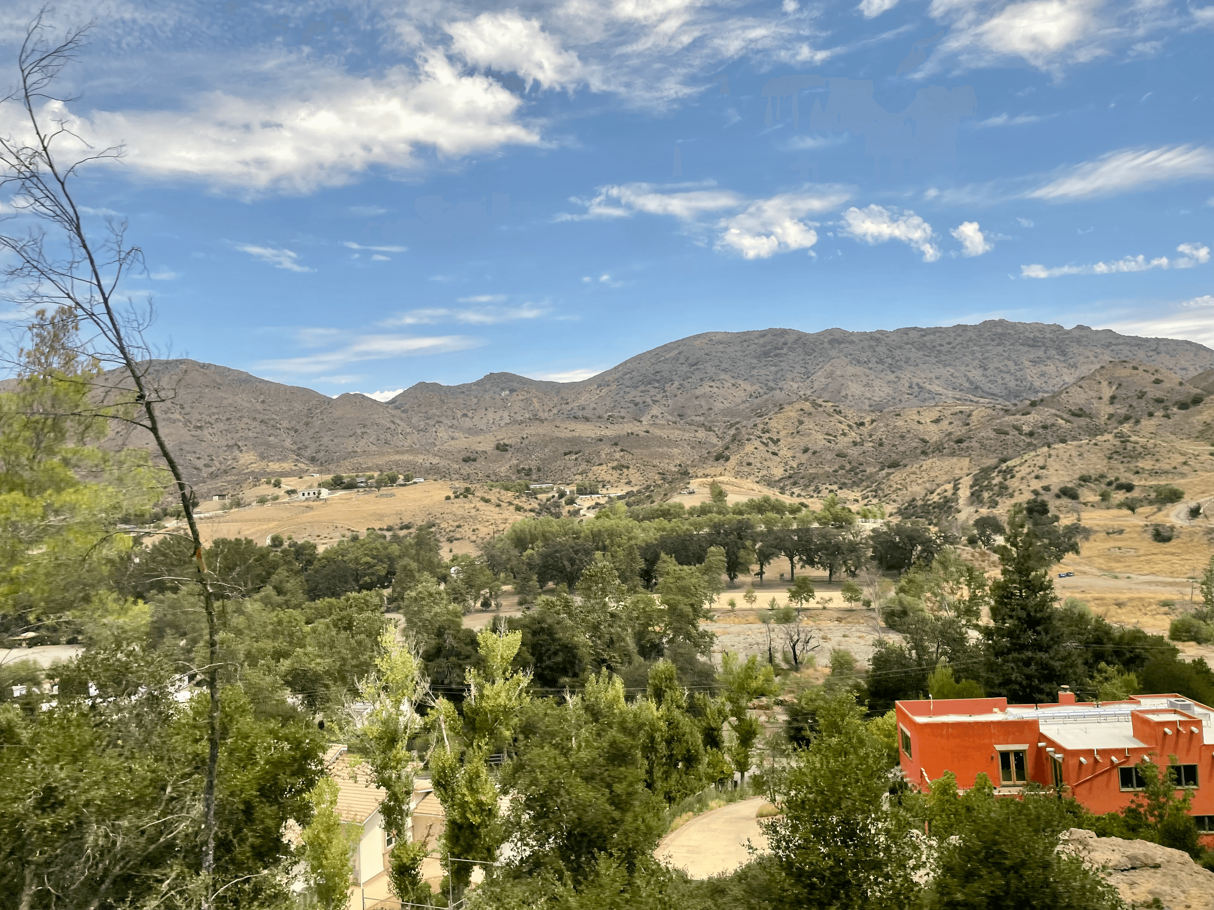 Red house among dry shrubs in Santa Monica Mountains