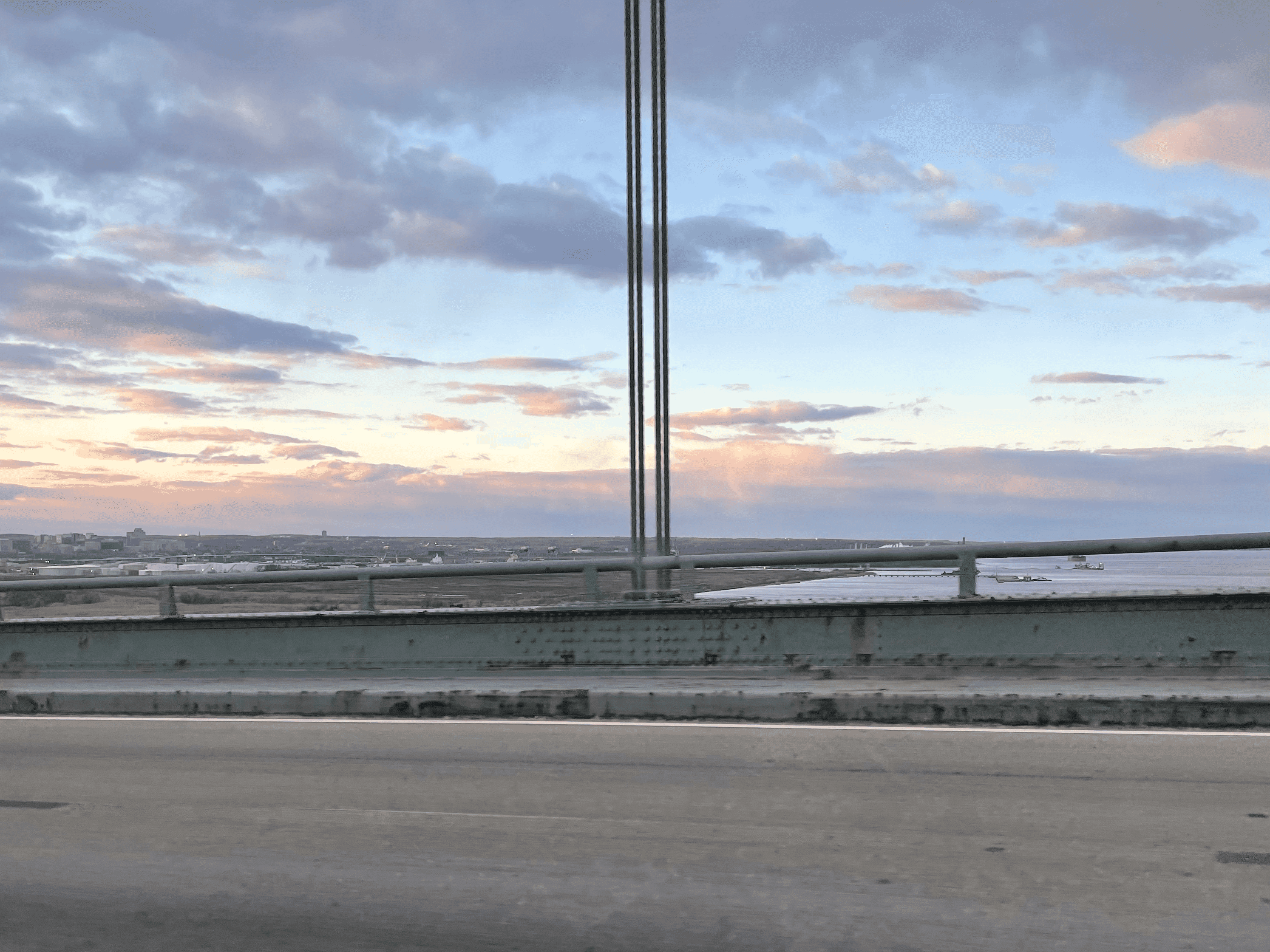 A sunset on a bridge