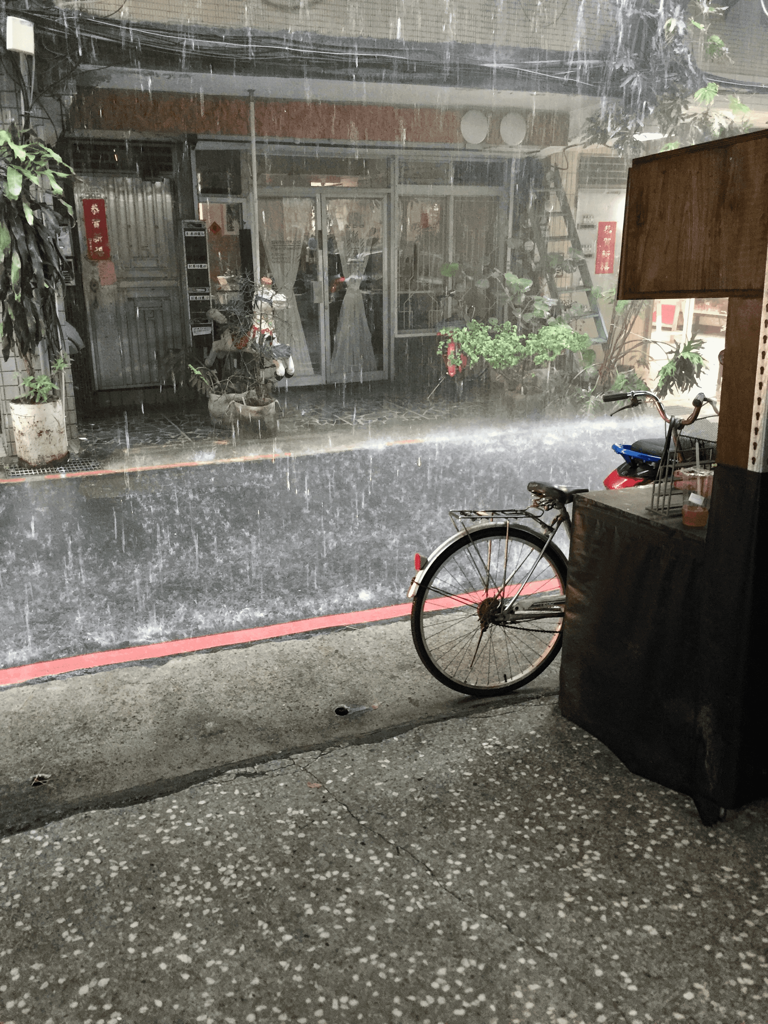 Rain pouring at a print shop